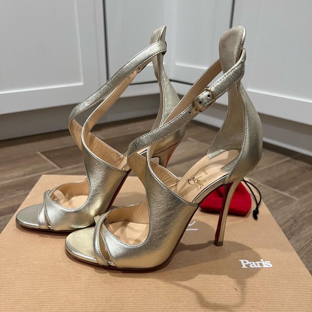 Christian Louboutin gold heels